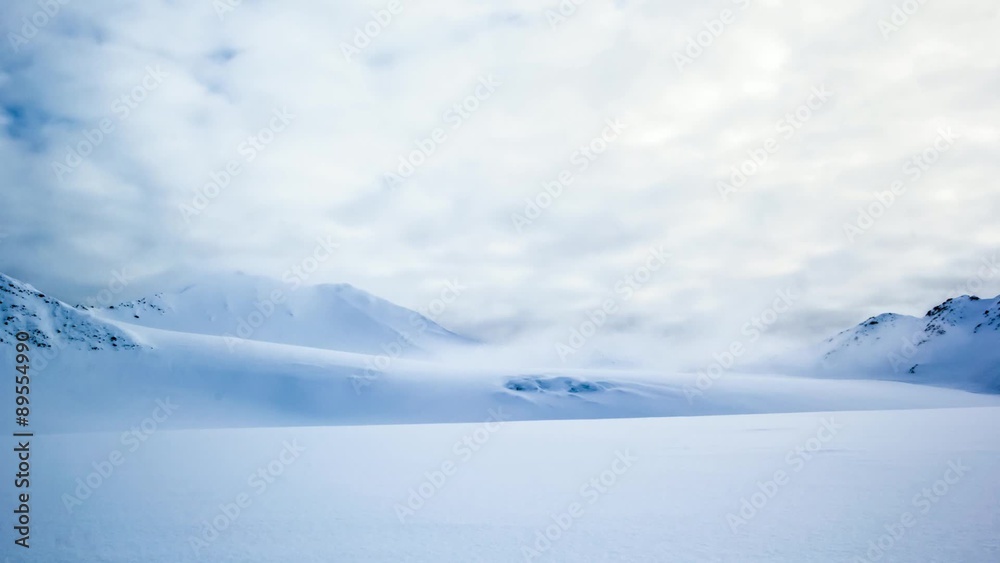 Arctic spring. Amazing clouds over Spitsbergens mountains.