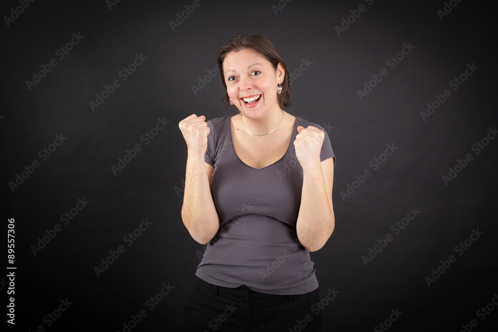 Beautiful woman doing different expressions in different sets of clothes: arms raised Beautiful woman doing different expressions in different sets of clothes: arms raised