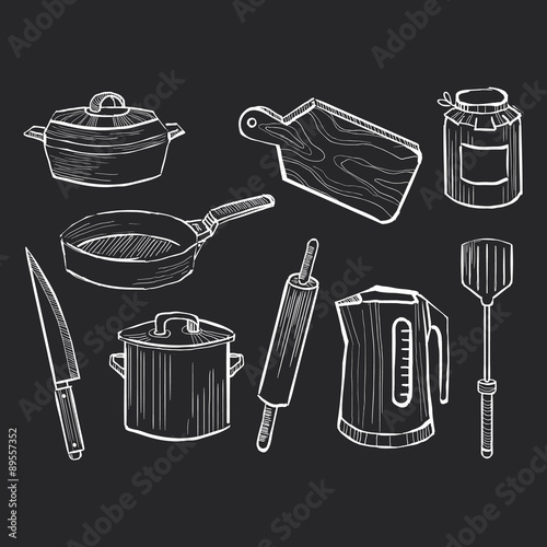 Hand drawn set of kitchen utensils on a chalkboard 