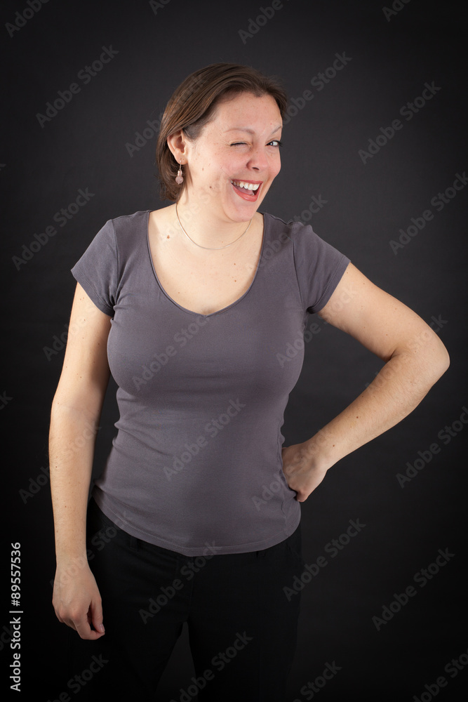 Beautiful woman doing different expressions in different sets of clothes: blinking Beautiful woman doing different expressions in different sets of clothes: blinking