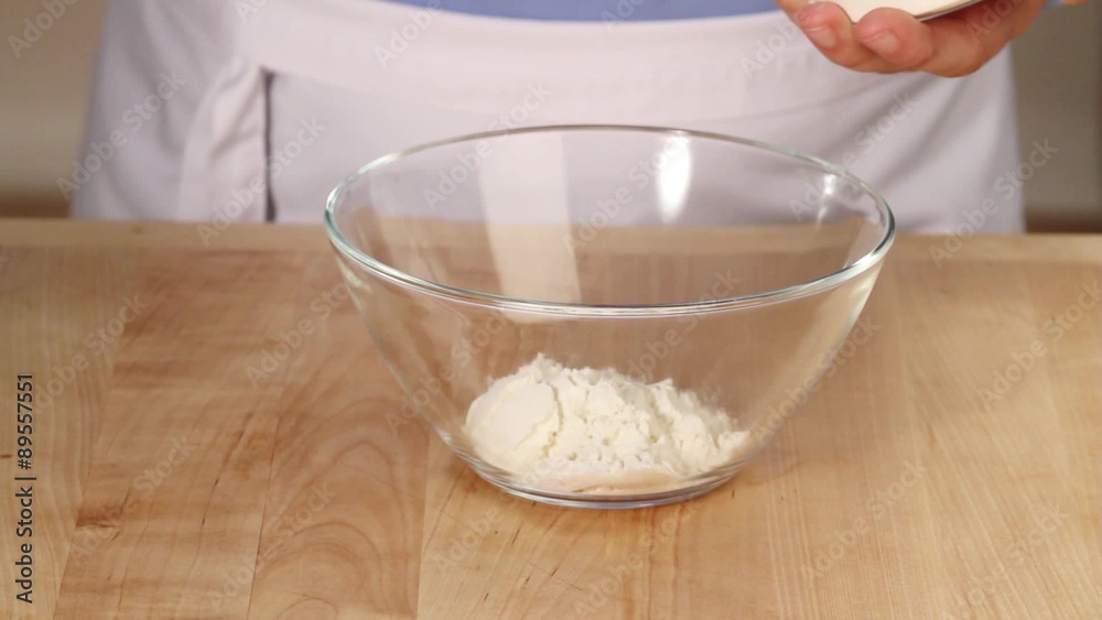 Flour being mixed with cornflour Flour being mixed with cornflour