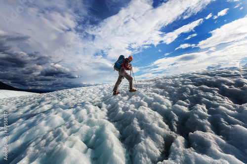 Hiker on glacier photo