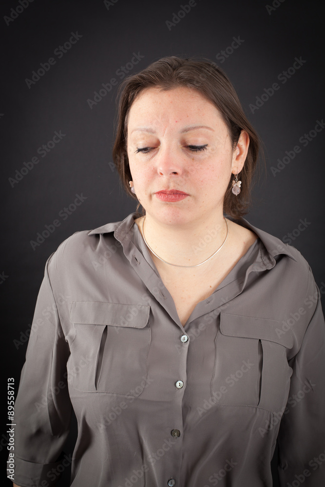 Beautiful woman doing different expressions in different sets of clothes: sad Beautiful woman doing different expressions in different sets of clothes: sad