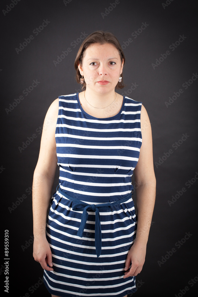Beautiful woman doing different expressions in different sets of clothes: angry Beautiful woman doing different expressions in different sets of clothes: angry