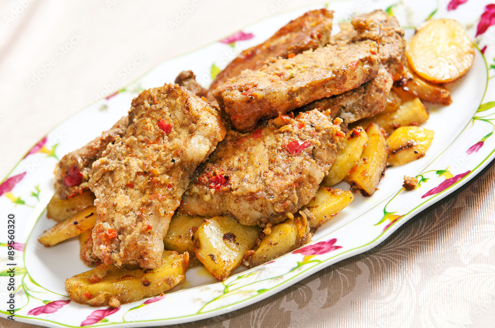Delicious pork tenderloin, stewed with baked potatoes. Delicious pork tenderloin, stewed with baked potatoes.