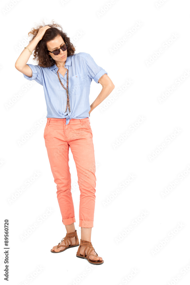 Beautiful woman doing different expressions in different sets of clothes: posing with sunglasses Beautiful woman doing different expressions in different sets of clothes: posing with sunglasses