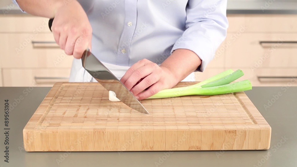 Man chopping leek, close-up