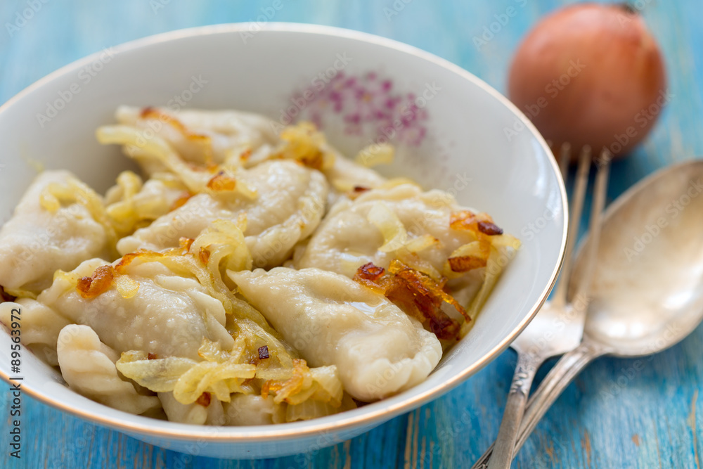 Dumplings with potatoes and fried onions. Dumplings with potatoes and fried onions.