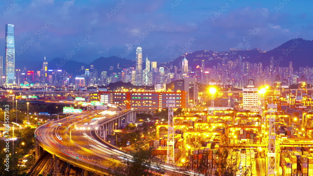Panning timelapse video of cargo terminal in Hong Kong from day to night Panning timelapse video of cargo terminal in Hong Kong from day to night