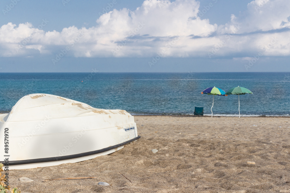 White boat on the beach