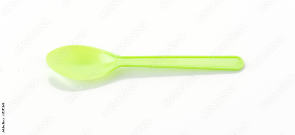 plastic spoon on white background plastic spoon on white background