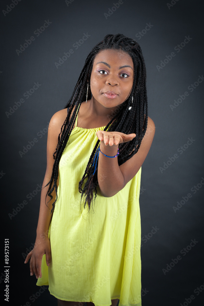 Beautiful girl doing different expressions in different sets of clothes: kiss Beautiful girl doing different expressions in different sets of clothes: kiss