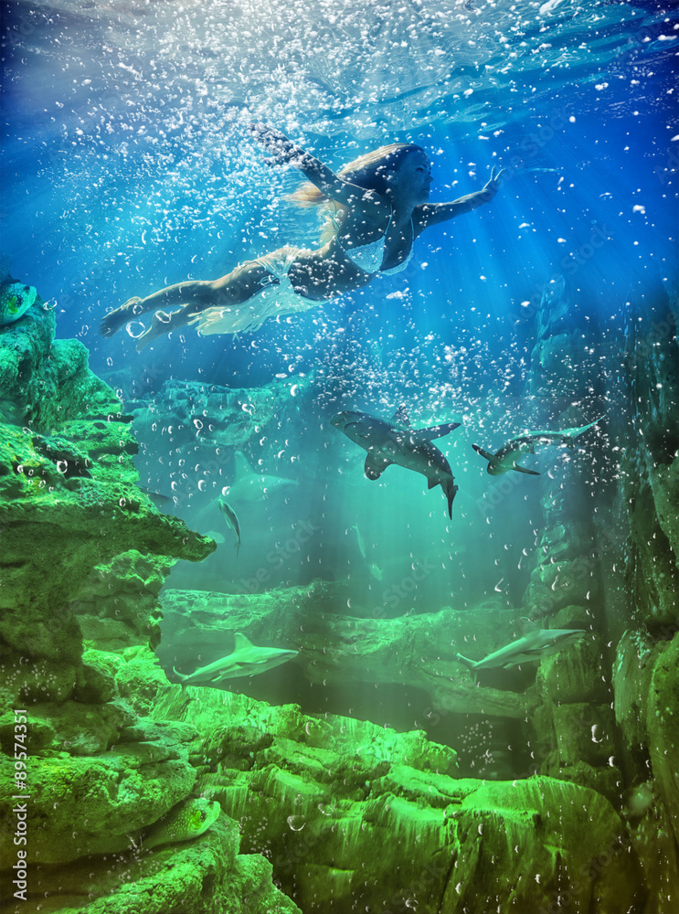 Fototapeta premium woman underwater in the sea