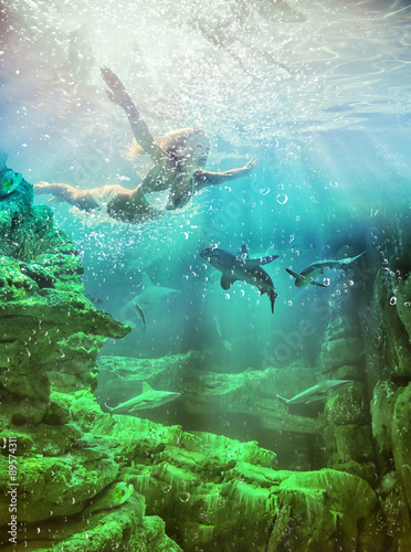 Fototapeta Naklejka Na Ścianę i Meble -  woman underwater in the sea