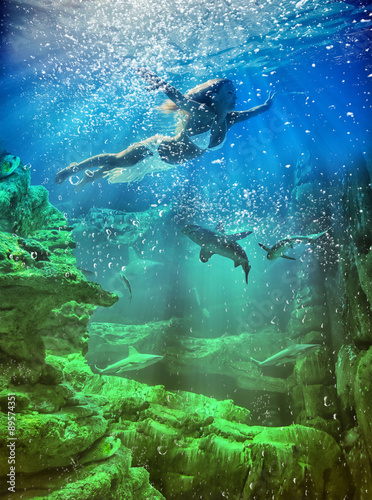 woman underwater in the sea © Netfalls