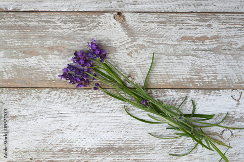 white grey old wooden shelves background with copyspace and lavender flowers decoration