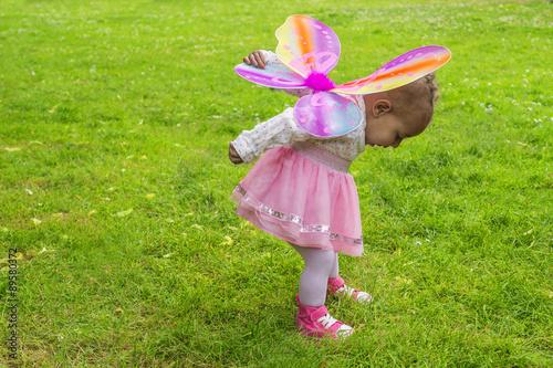 Cute toddler with butterfly wings