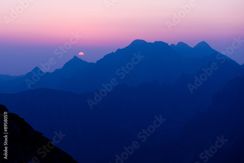 violet sunrise in the mountains of High Tatras; Slovakia