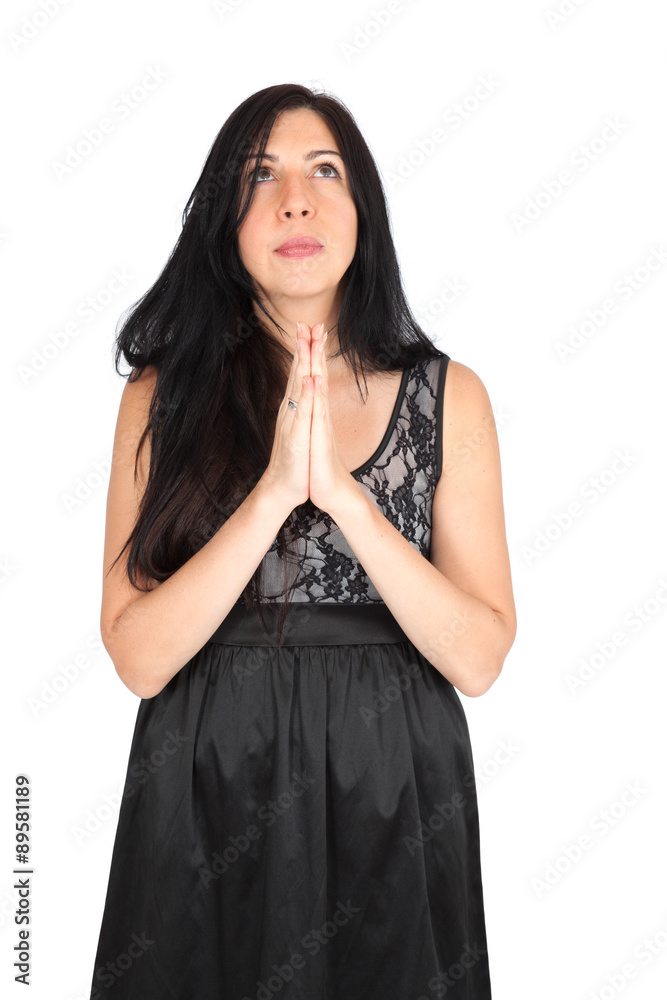 Beautiful woman doing different expressions in different sets of clothes: praying