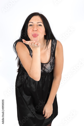 Beautiful woman doing different expressions in different sets of clothes: kiss