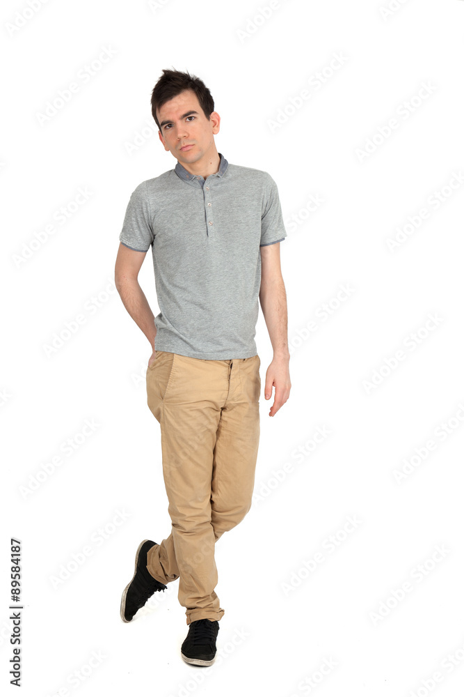 Fototapeta premium Handsome man doing different expressions in different sets of clothes: full length posing
