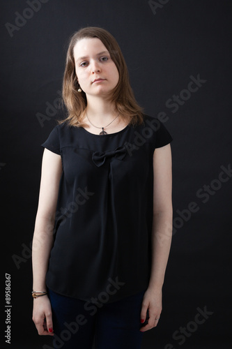 Beautiful woman doing different expressions in different sets of clothes: tired