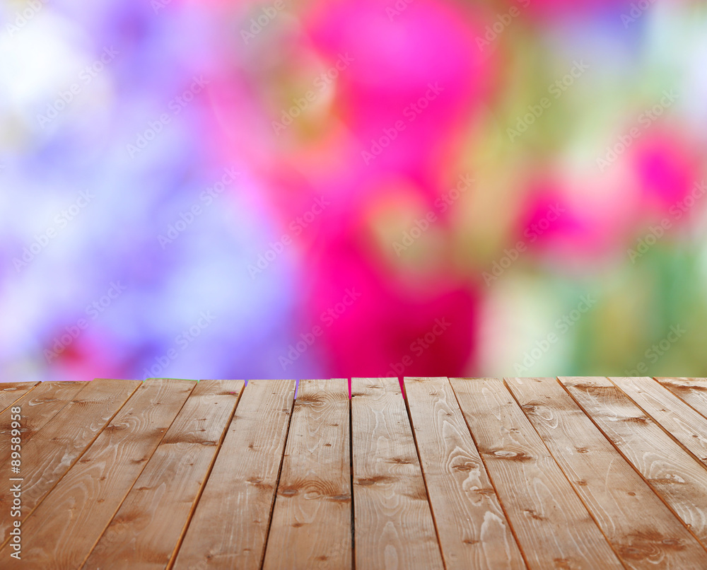 Wooden table with abstract blur background Wooden table with abstract blur background