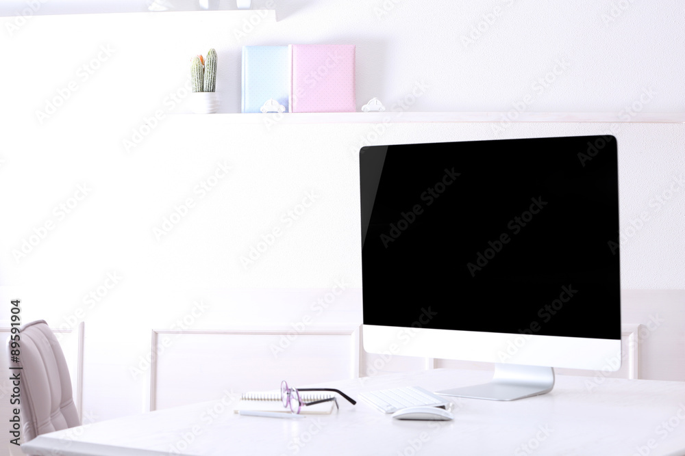 Workplace with computer in room Workplace with computer in room