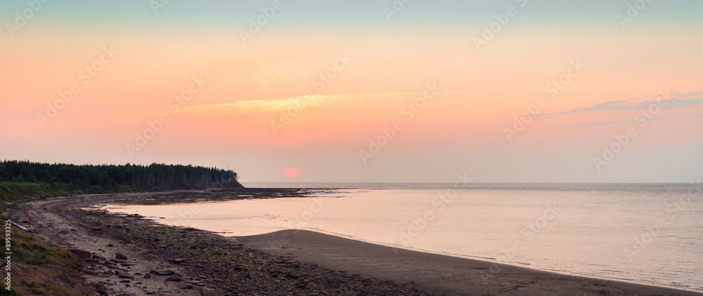 Fototapeta premium Panoramic view of sunset at Northumberland Strait near the Confederation Bridge mainland New Brunswick