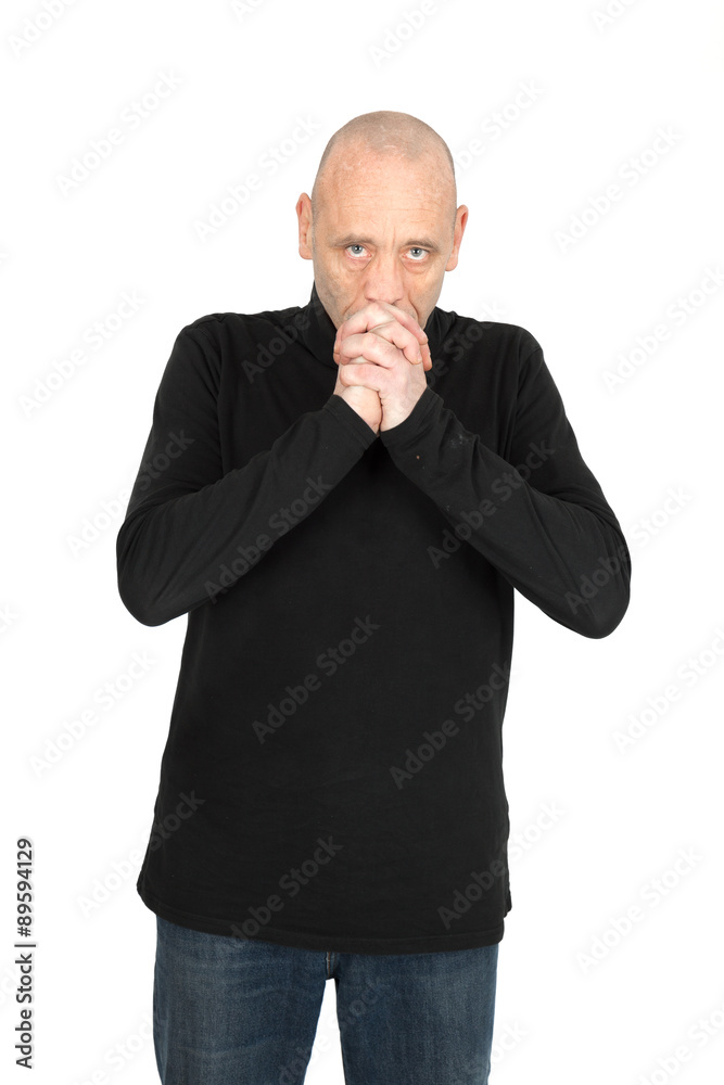 Handsome man doing different expressions in different sets of clothes: prayer Handsome man doing different expressions in different sets of clothes: prayer