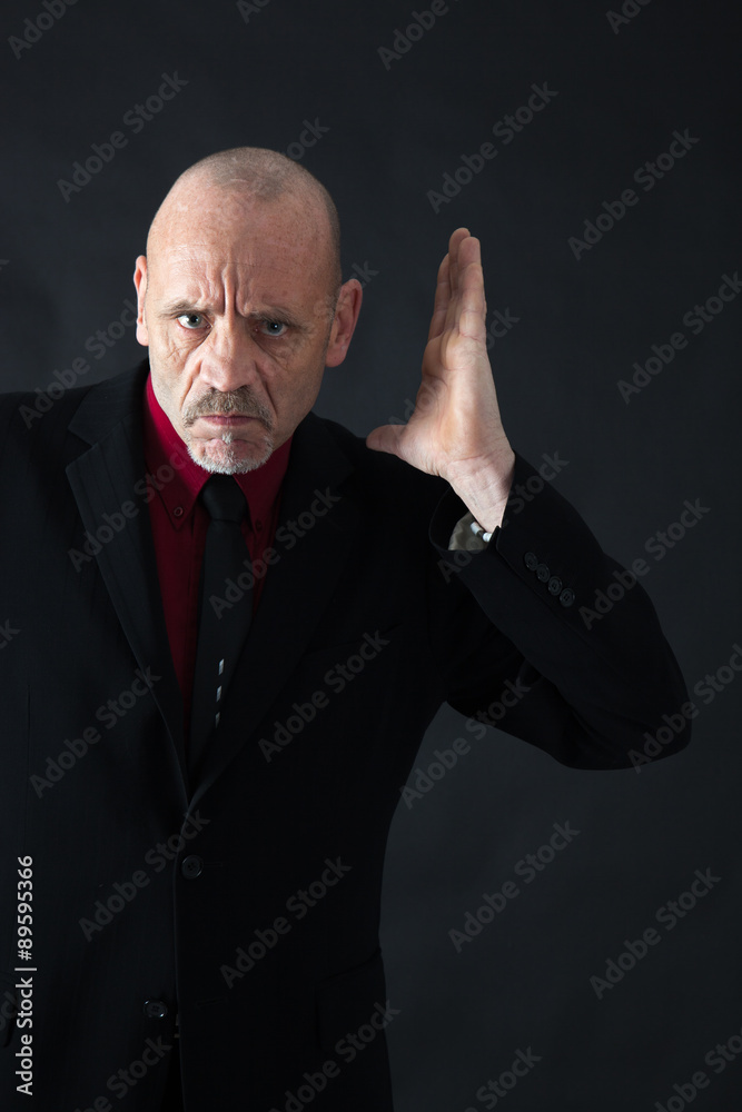 Obraz premium Handsome man doing different expressions in different sets of clothes: be careful