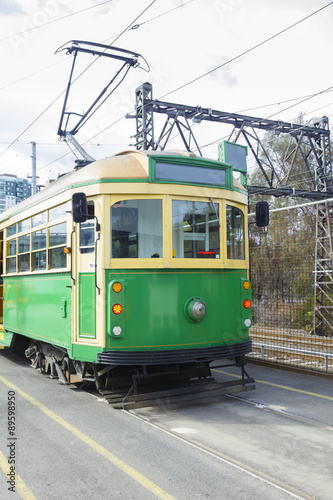 Melbourne’s green and yellow classic tram © sunflowerey
