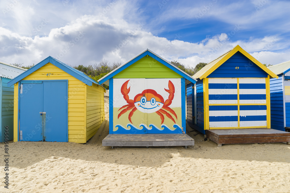 Naklejka premium Colourful bathing houses at Dendy Street Beach, Brighton in Melbourne