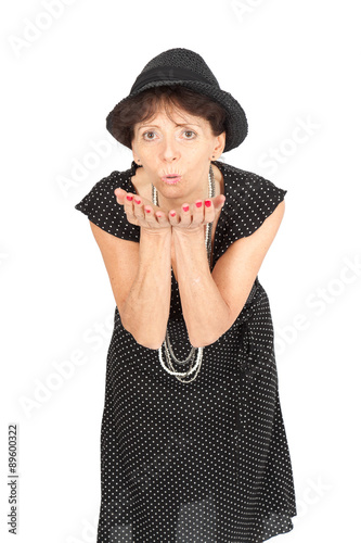 Beautiful woman doing different expressions in different sets of clothes: kiss