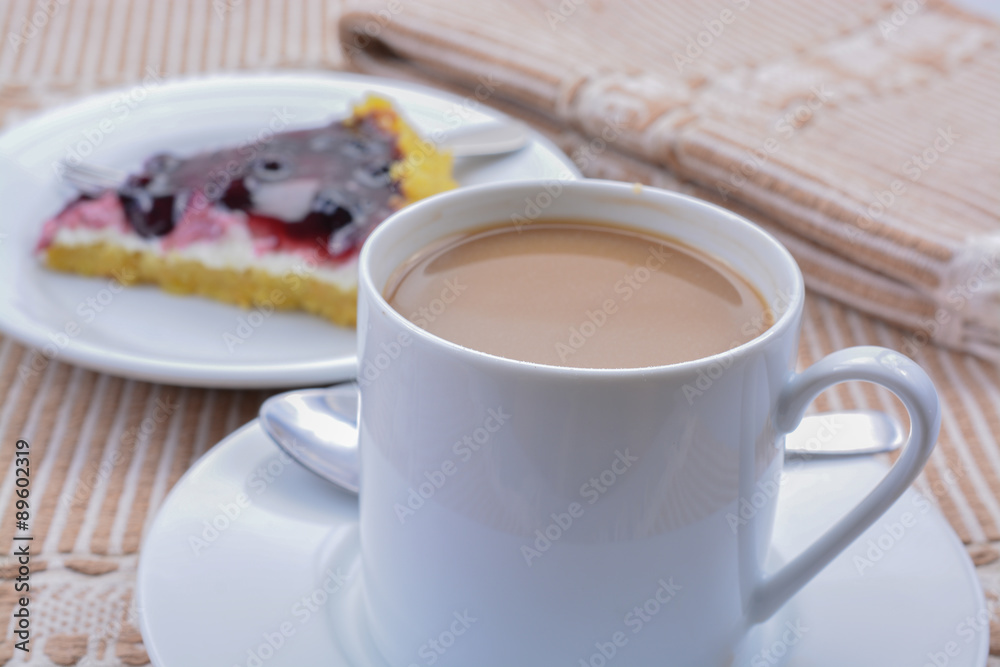 Coffee and dessert on brown table cloth. Coffee and dessert on brown table cloth.