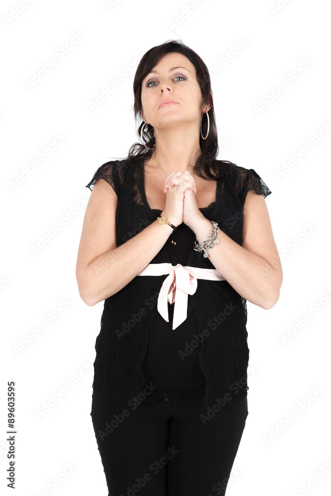 Beautiful woman doing different expressions in different sets of clothes: praying Beautiful woman doing different expressions in different sets of clothes: praying