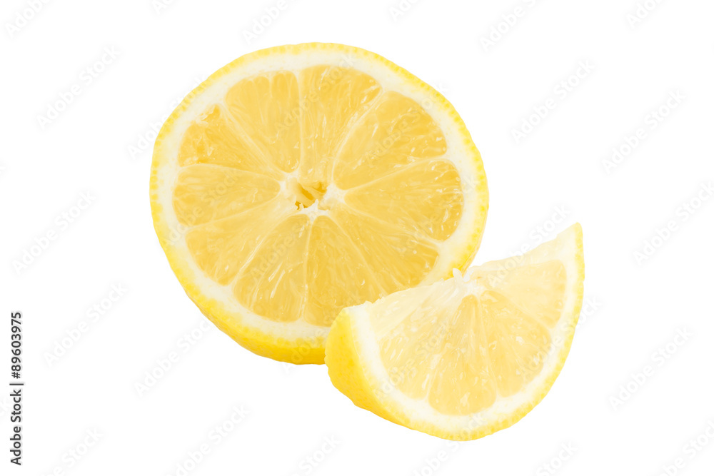 Close-up of half and quarter slices of lemon, isolated on white background.