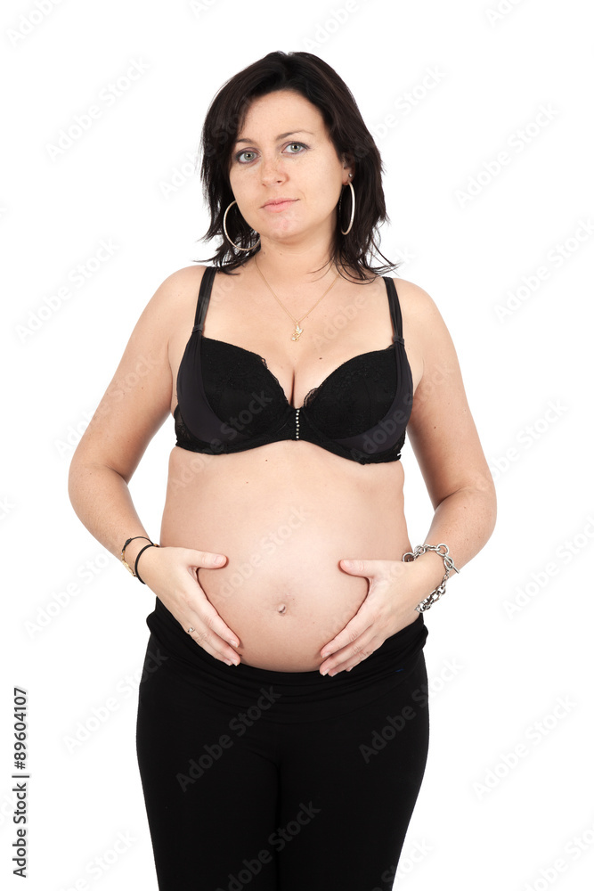 Beautiful woman doing different expressions in different sets of clothes: pregnant woman posing Beautiful woman doing different expressions in different sets of clothes: pregnant woman posing