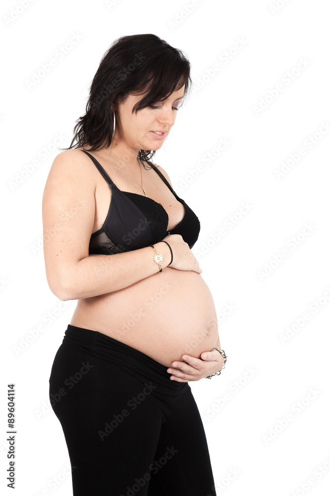 Beautiful woman doing different expressions in different sets of clothes: pregnant woman posing Beautiful woman doing different expressions in different sets of clothes: pregnant woman posing