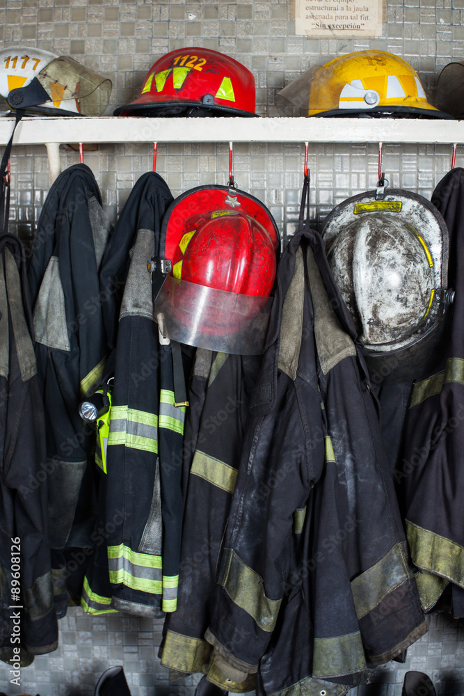 Fototapeta premium Firefighter Suits And Helmets At Fire Station