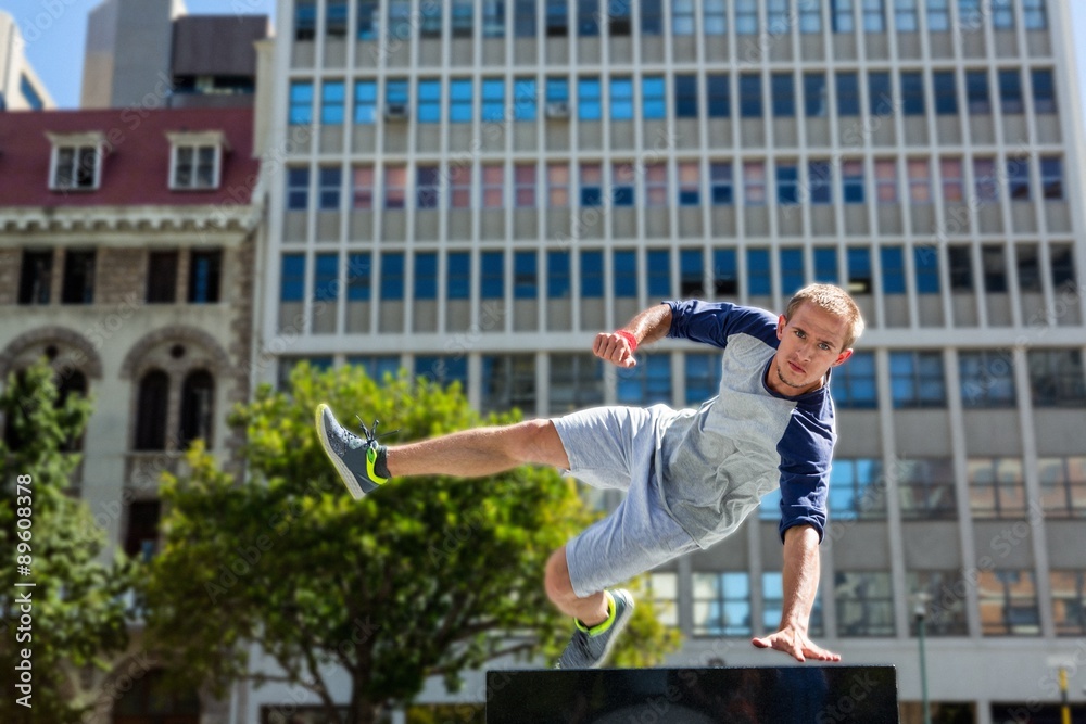  Man doing parkour in the city