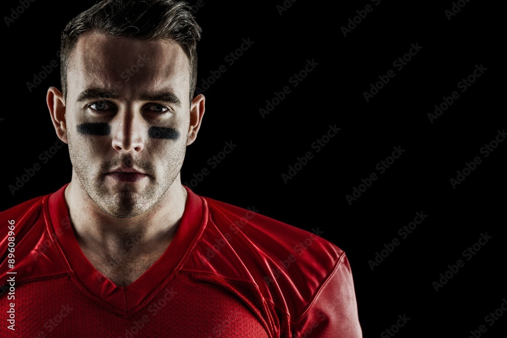 Obraz premium American football player looking at camera
