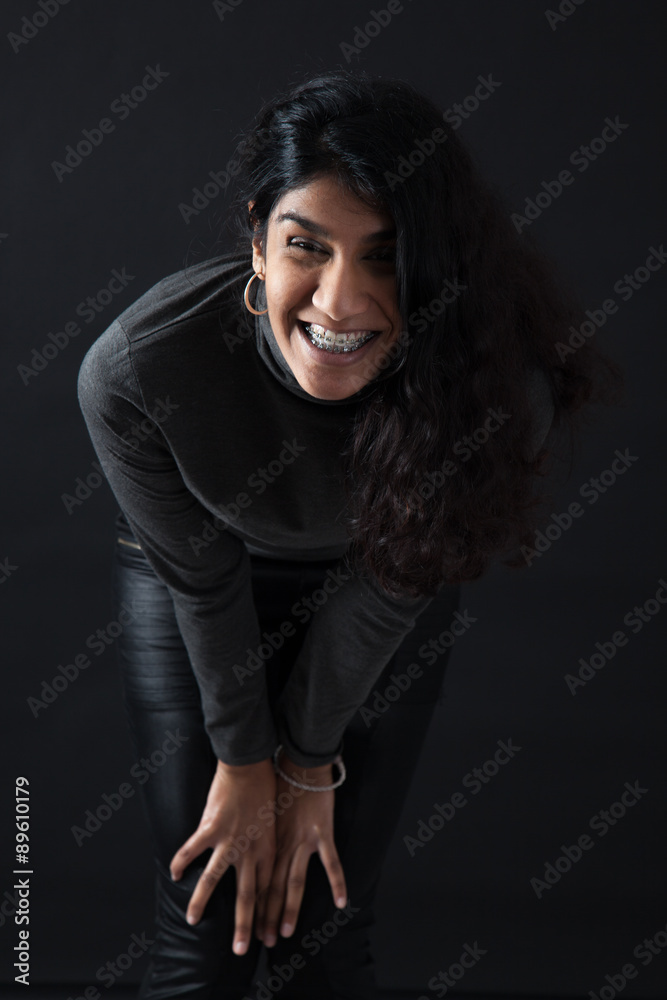 Beautiful woman doing different expressions in different sets of clothes: love Beautiful woman doing different expressions in different sets of clothes: love