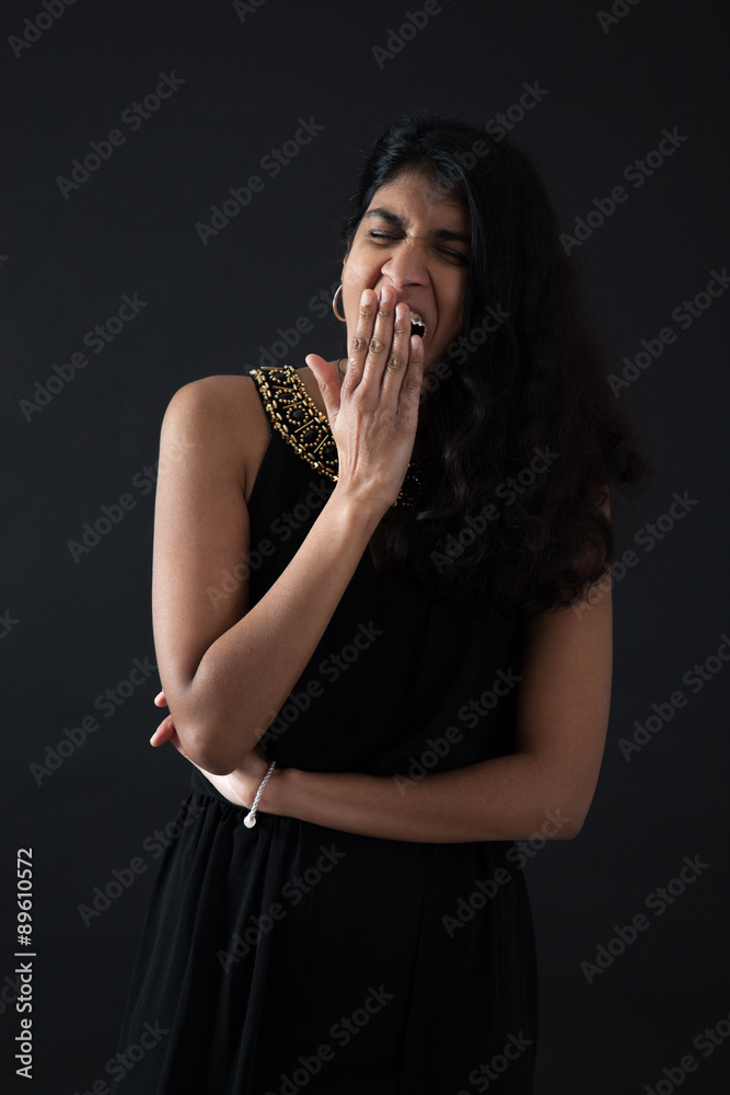Plakat Beautiful woman doing different expressions in different sets of clothes: yawn