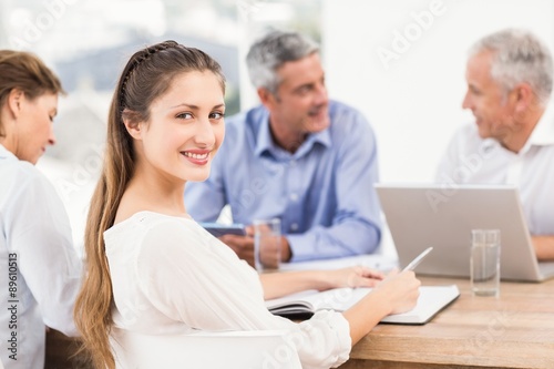 Smiling businesswoman during a meeting