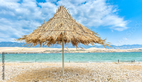 Beach umbrella on a windy day