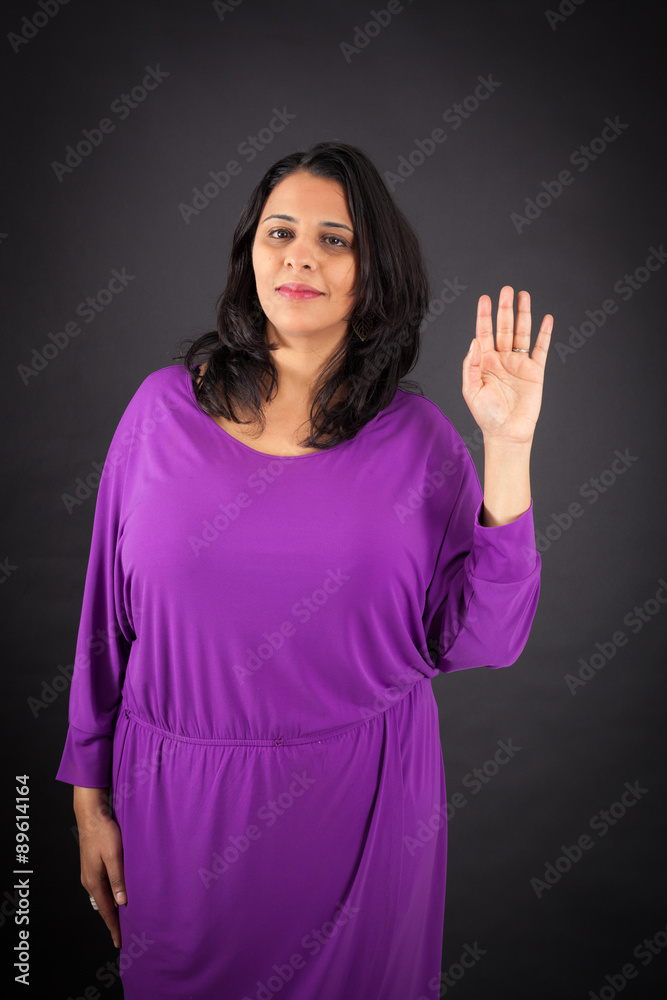 Beautiful woman doing different expressions in different sets of clothes: waving Beautiful woman doing different expressions in different sets of clothes: waving