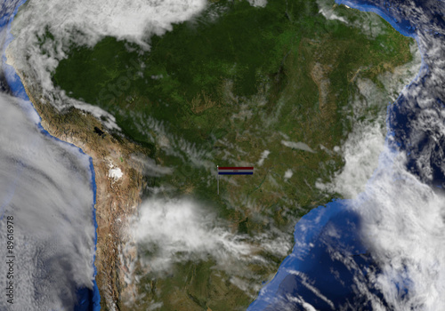 Fototapeta Naklejka Na Ścianę i Meble -  Paraguay flag on pole on earth globe illustration - Elements of this image furnished by NASA