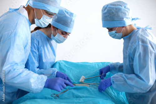 A team of surgeons at work in the operating room