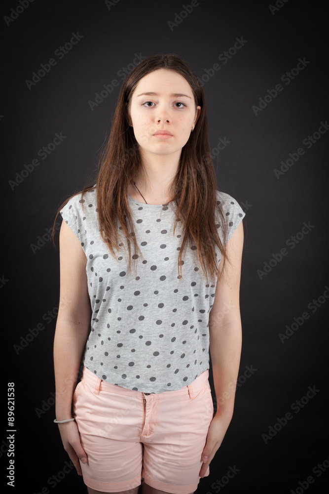beautiful woman doing different expressions in different sets of clothes: at attention beautiful woman doing different expressions in different sets of clothes: at attention
